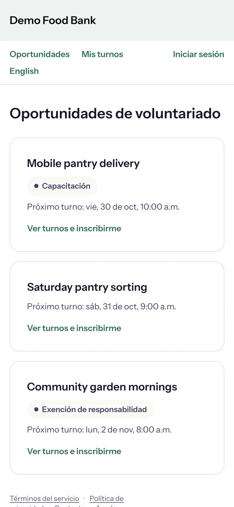 The portal home in Spanish on a phone: Oportunidades de voluntariado and Ver turnos e inscribirme, with English in the menu. The opportunity names stay as the organization wrote them
